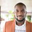 istockphoto-517302398-612×612 Attractive young African man looking at camera. Contented young man with facial hair and moustache facing camera, Nigeria, Africa.